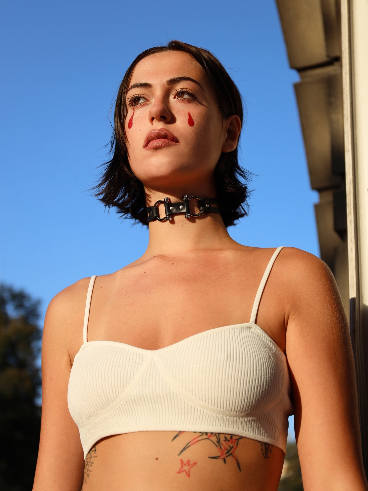 Aurora outside with the plant-based Dakota choker by Baby turns Blue