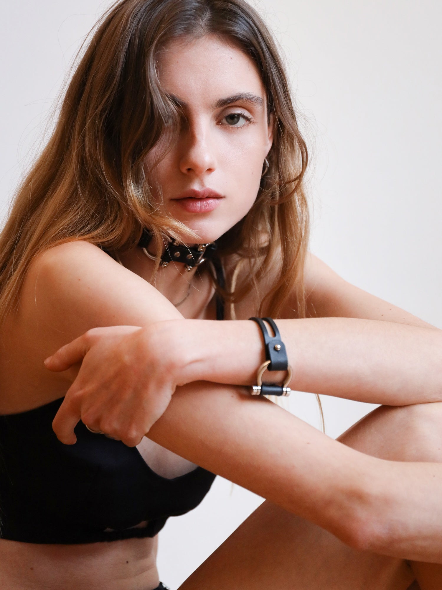 Dara casually posing with the Dakota cuff and choker by Baby turns Blue Paris