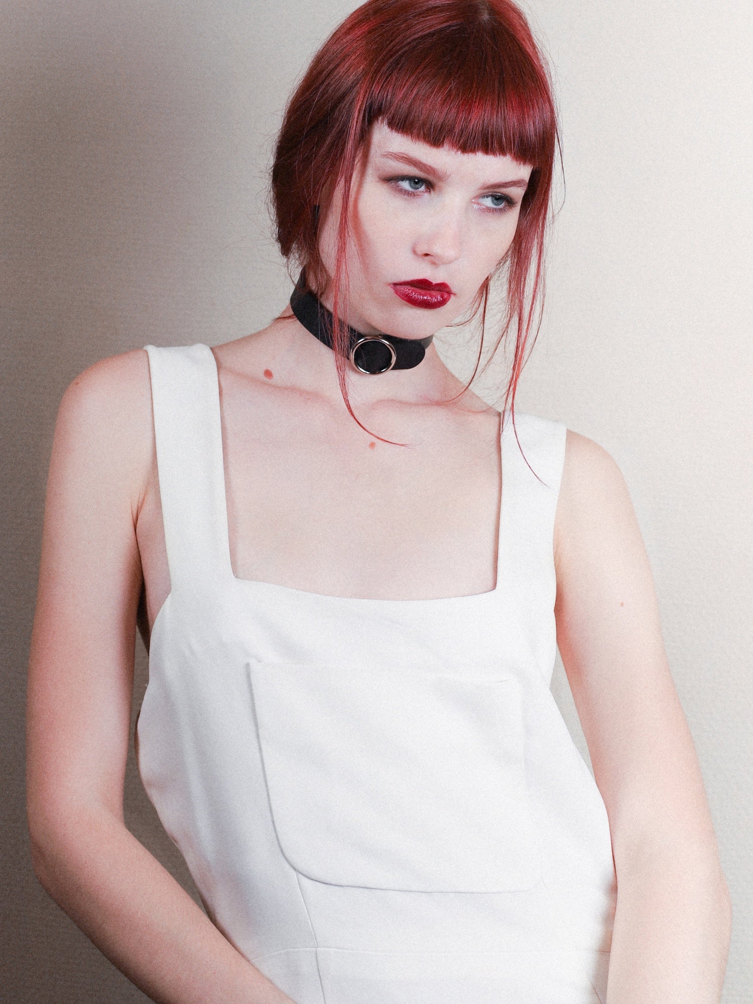 Gala indoors wearing the Dora vegan choker by Baby turns Blue Paris
