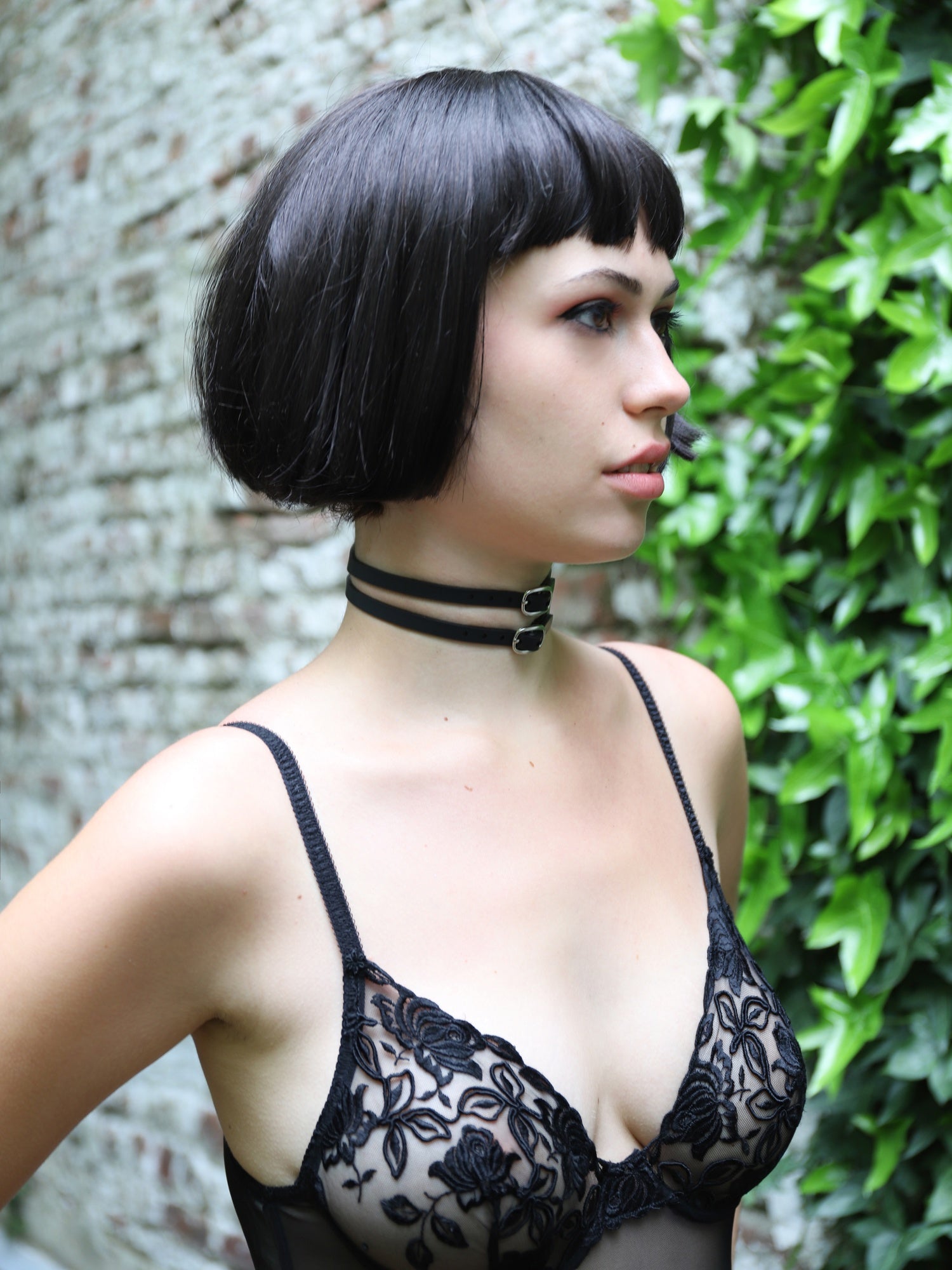 Aurora in the garden smiling with the Lola choker by Baby turns Blue Paris