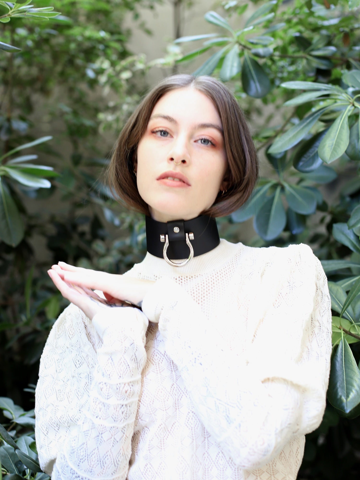 Lou outdoors posing with the vegan leather choker Masha by Baby turns Blue Paris