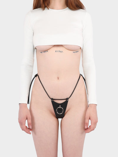 Front view of a model wearing the vegan Mathilda thong by Baby turns Blue Paris