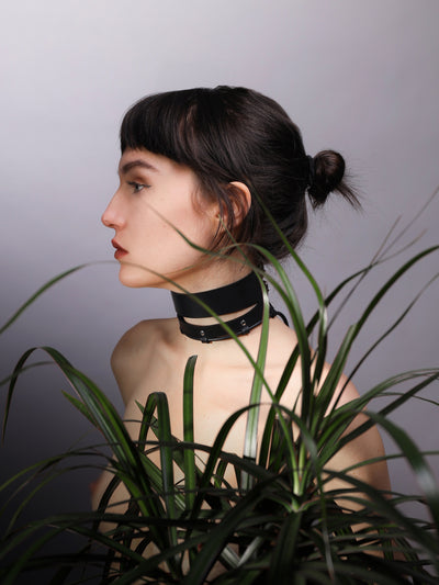 Maria behind plants wearing the Dawn choker by Baby turns Blue Paris