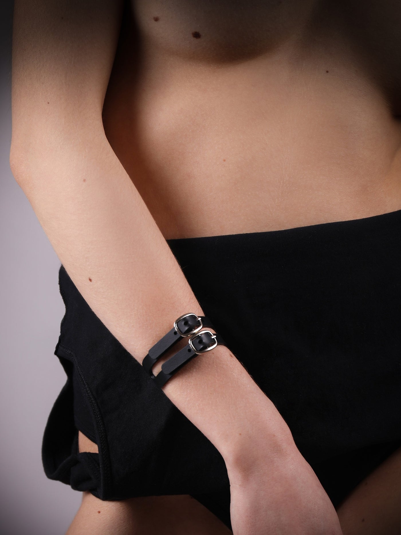 Close-up of the Lola cuff around the wrist of a model
